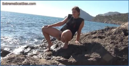 Nadya Poops and Pees by the Sea in Real Scat Action